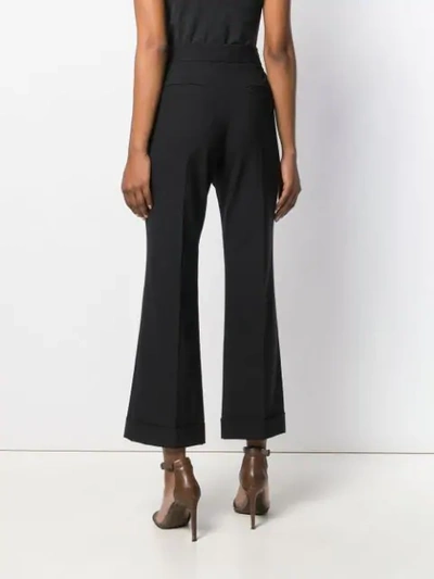 Shop Brunello Cucinelli Cropped Flared Trousers In Black