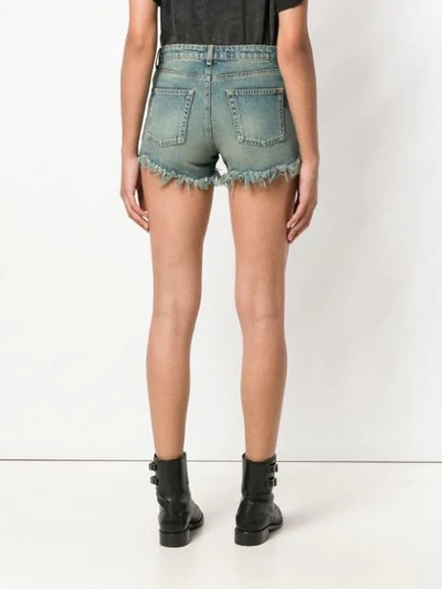 Shop Saint Laurent Distressed Ripped Shorts In Blue