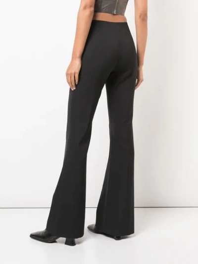 Shop Maison Margiela Flared Trousers In Black