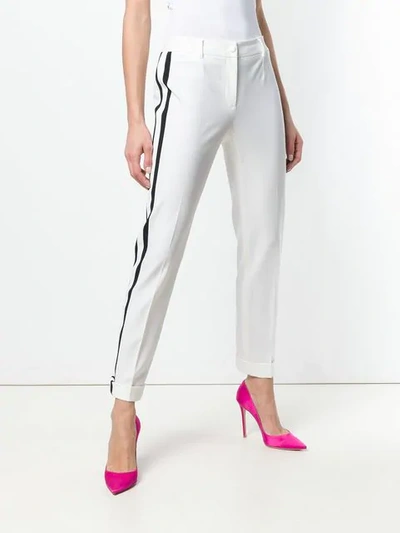 Shop Dolce & Gabbana Side Stripes Trousers In White