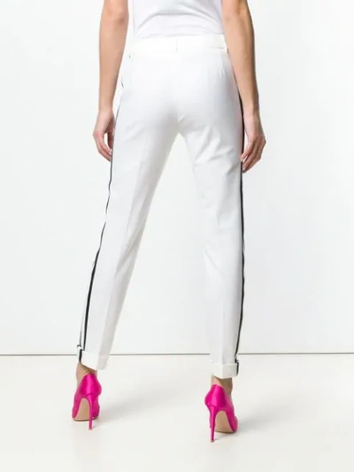 Shop Dolce & Gabbana Side Stripes Trousers In White