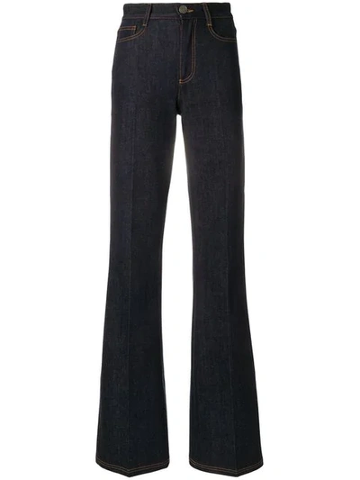 Shop Fendi Flared Jeans In Blue