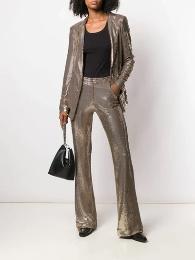 Shop Ainea Flared Sequin Trousers In Gold