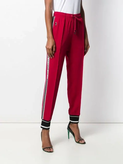 Shop Dolce & Gabbana Appliqué Striped Track Pants In Red