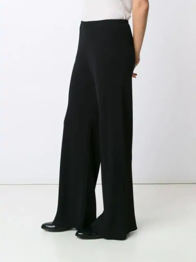 Shop The Row Palazzo Pants In Black