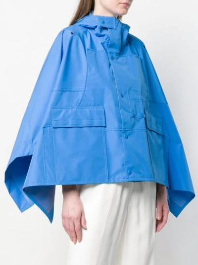 Shop Courrèges Hooded Rain Poncho - Blue