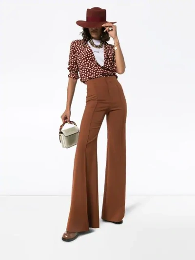 Shop Chloé High-waisted Flared Trousers In Brown