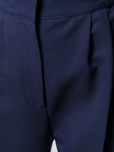 Shop Alexander Mcqueen Cropped Peg Trousers In Blue