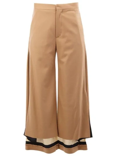Shop Undercover Contrast Hem High Waisted Trousers - Neutrals