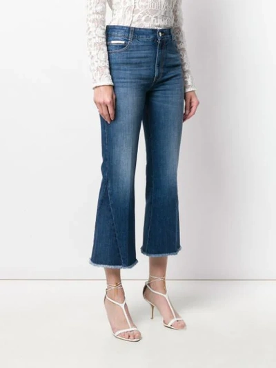 Shop Stella Mccartney Cropped Flared Jeans In Blue