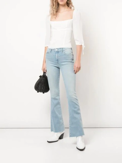 Shop Mother The Weekender Flared Jeans In Blue