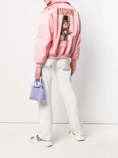 Shop Moschino Printed Bomber Jacket In Pink