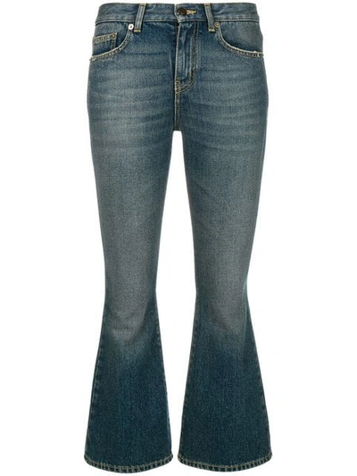 Shop Saint Laurent Cropped Bootcut Jeans In Blue