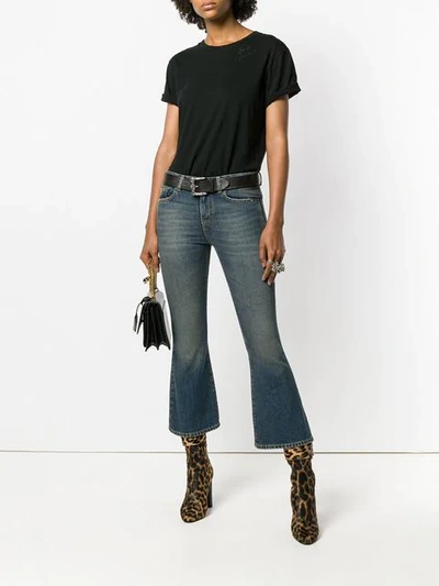 Shop Saint Laurent Cropped Bootcut Jeans In Blue