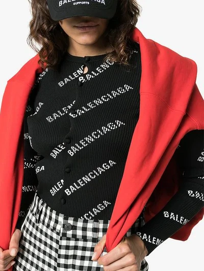 Shop Balenciaga Logo Print Ribbed Knitted Cardigan In Black