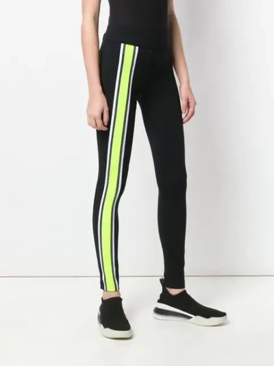 Shop No Ka'oi Front And Side Stripe Sports Leggings In Black