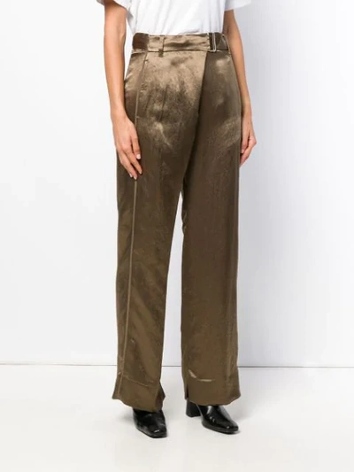 Shop Ann Demeulemeester Belted Palazzo Trousers In Green
