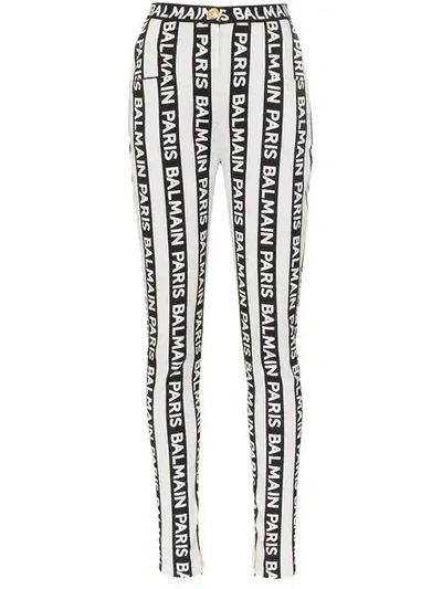 Shop Balmain Stripe Logo Skinny Jeans In Black