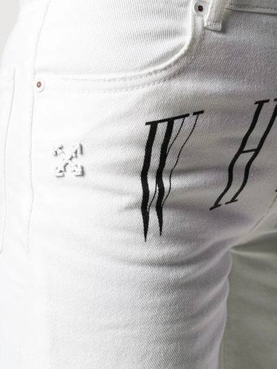 Shop Off-white Logo Print Jeans In White