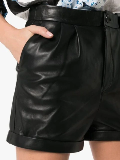 Shop Frame Pleated Leather Shorts In Black