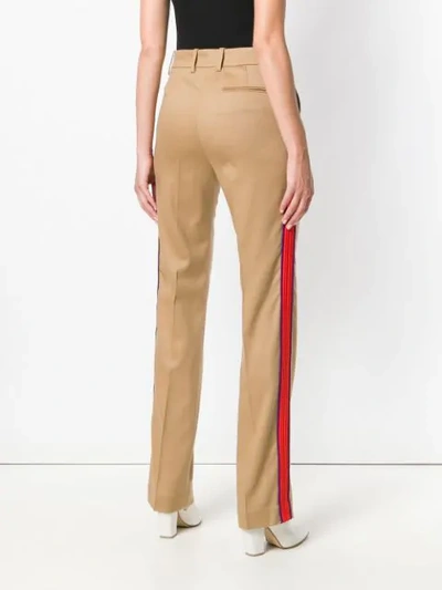 Shop Pinko Side Stripe Flared Trousers In Neutrals