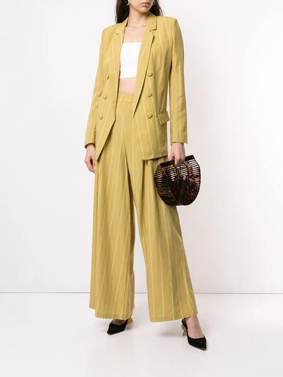 Shop Atoir Always Ascending Trousers In Yellow