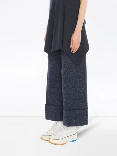 Shop Jw Anderson Turn Up Cuffs Trousers In Blue