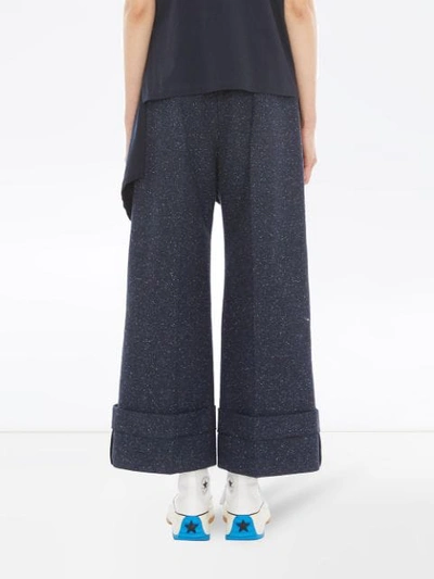 Shop Jw Anderson Turn Up Cuffs Trousers In Blue