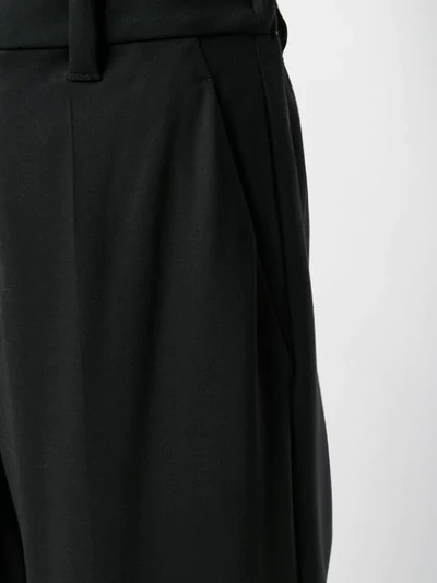 Shop Brunello Cucinelli Flared Trousers - Black