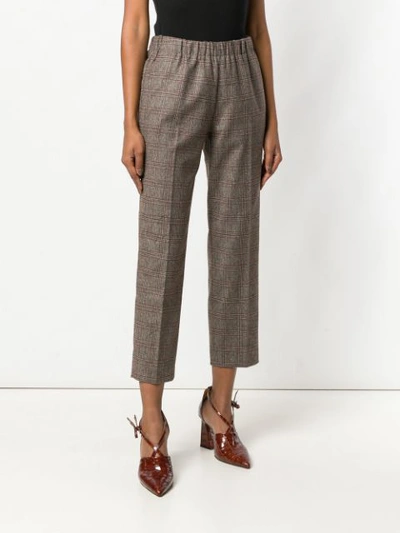 Shop Kiltie Tapered Trousers In Brown