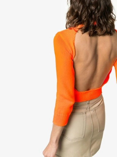 Shop Les Rêveries Backless Long-sleeved Knitted Crop Top In Orange