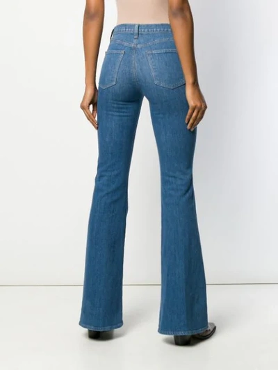 Shop J Brand Wide Leg Flared Jeans In Blue