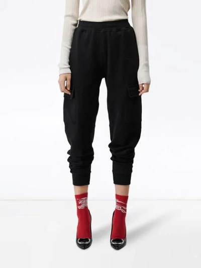 Shop Burberry Pocket Detail Cotton Jersey Trackpants In Black