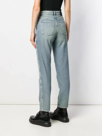 Shop Miu Miu Embellished Slim Jeans - Blue