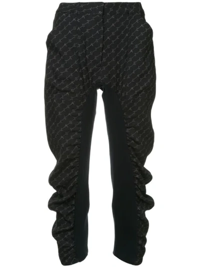 Shop Stella Mccartney Tina Monogram Trousers In Black