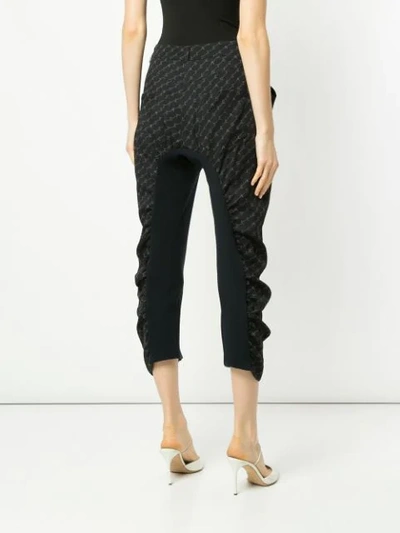 Shop Stella Mccartney Tina Monogram Trousers In Black