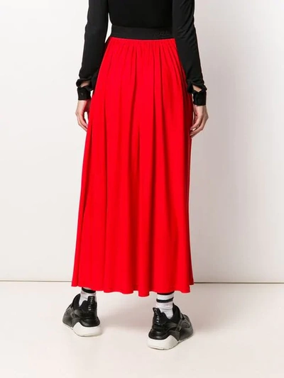 Shop Msgm Flared Midi Skirt In Red