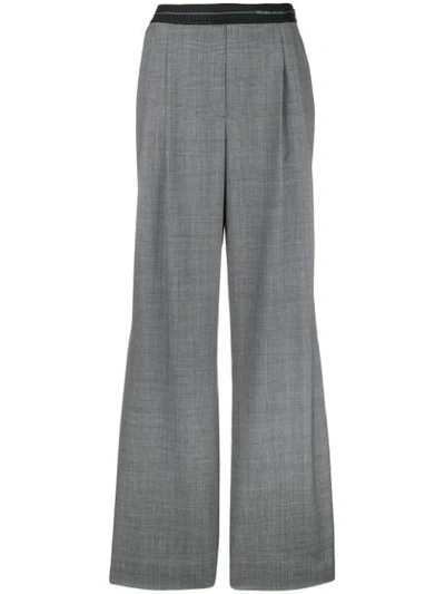 Shop Prada Prince Of Wales Flared Trousers In Grey