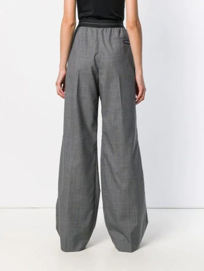 Shop Prada Prince Of Wales Flared Trousers In Grey