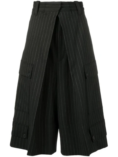 Shop Jw Anderson Cropped Pinstripe Trousers In Black