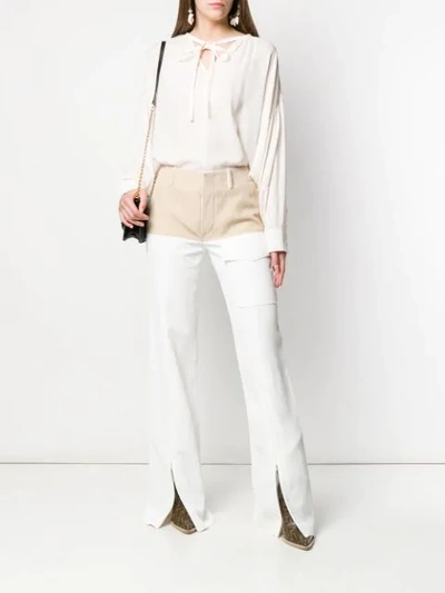 Shop Chloé Contrast Panel Trousers In White