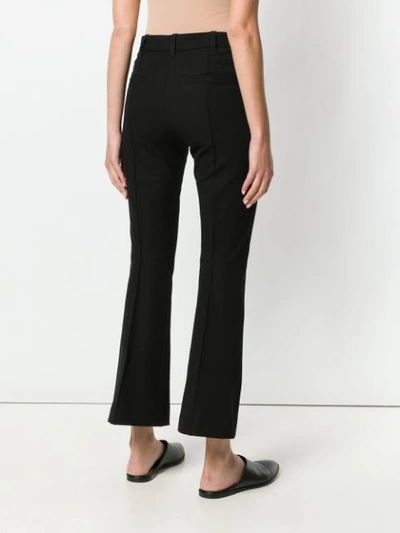 Shop Joseph Flared Tailored Trousers In Black