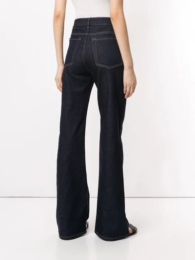 Shop Nina Ricci Flared Jeans In Blue