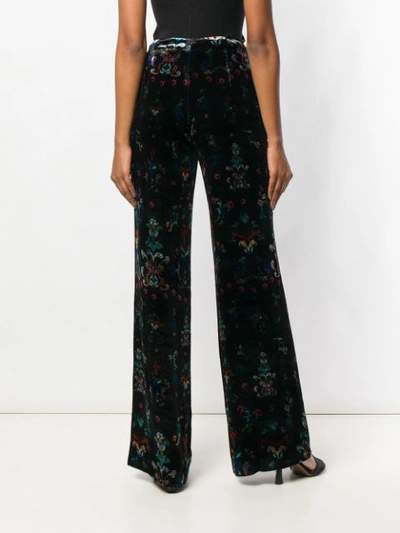 Shop Ailanto Floral Print Velvet Trousers In Black