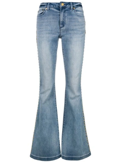 Shop Michael Michael Kors Studded Flared Jeans In Blue