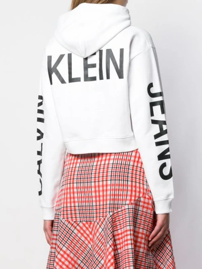 Shop Calvin Klein Jeans Est.1978 Cropped Logo Print Hoodie In White
