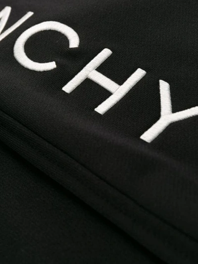 Shop Givenchy High Waisted Logo Trousers In Black