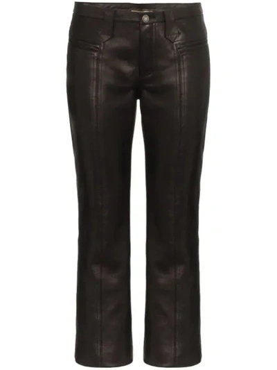 Shop Saint Laurent Kick Flare Leather Trousers In Black