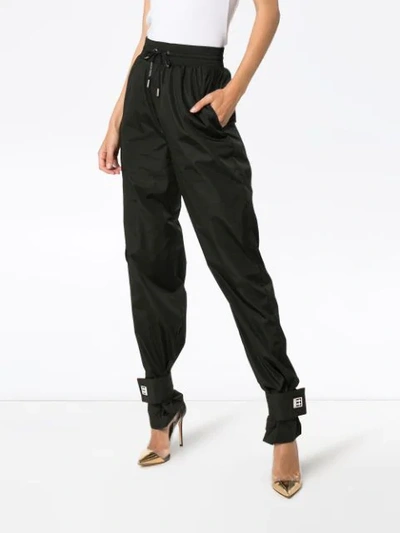 Shop Off-white High-waisted Track Pants In Black