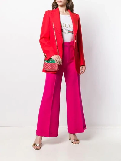 Shop Gucci High-rise Flared Trousers In Pink